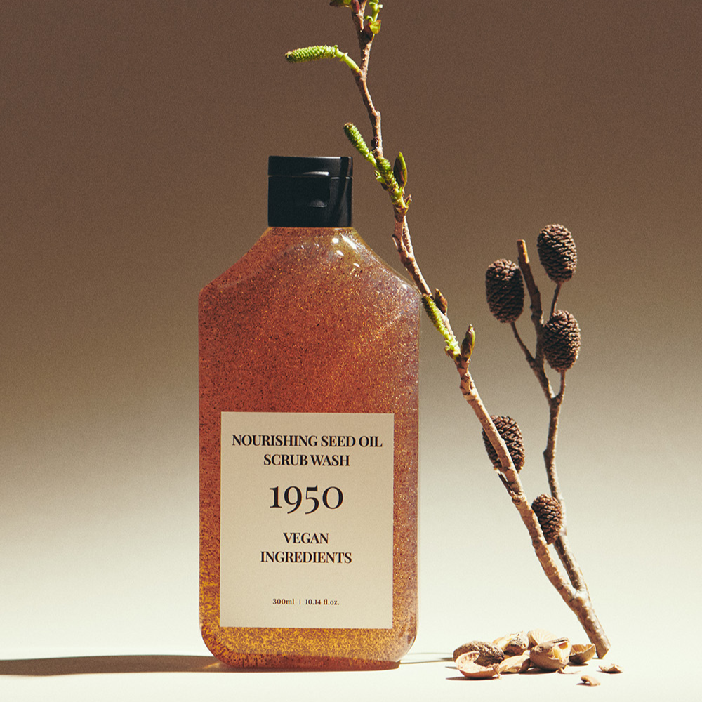 300ml of 1950 Jeju Nourishing Seed Oil Scrub Wash, a product for exfoliation and skin hydration with nourishing seed oils.