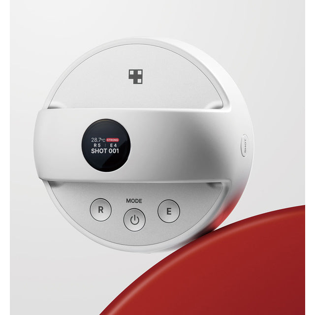 a close up of Medicube Age-R Contour Body Shaping Device on red object