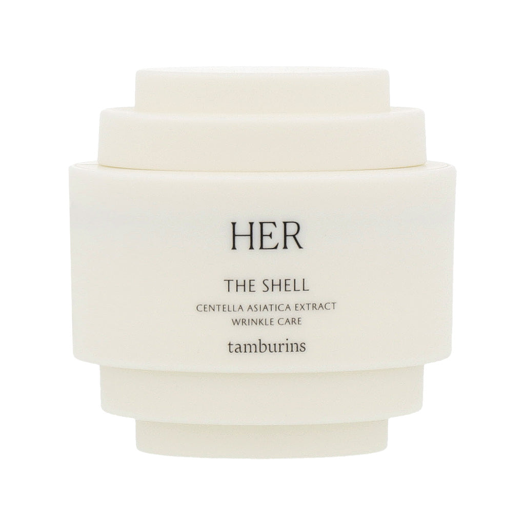 A 15ml white container with TAMBURINS THE SHELL Perfume Hand cream inside.