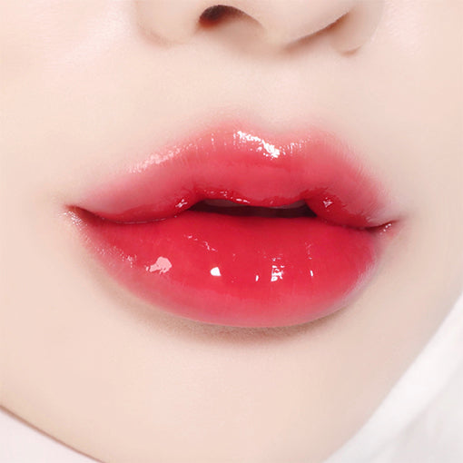 AMUSE Bebe Tint 3.8g: A stylish lip tint offering rich color in a portable size, perfect for everyday wear.