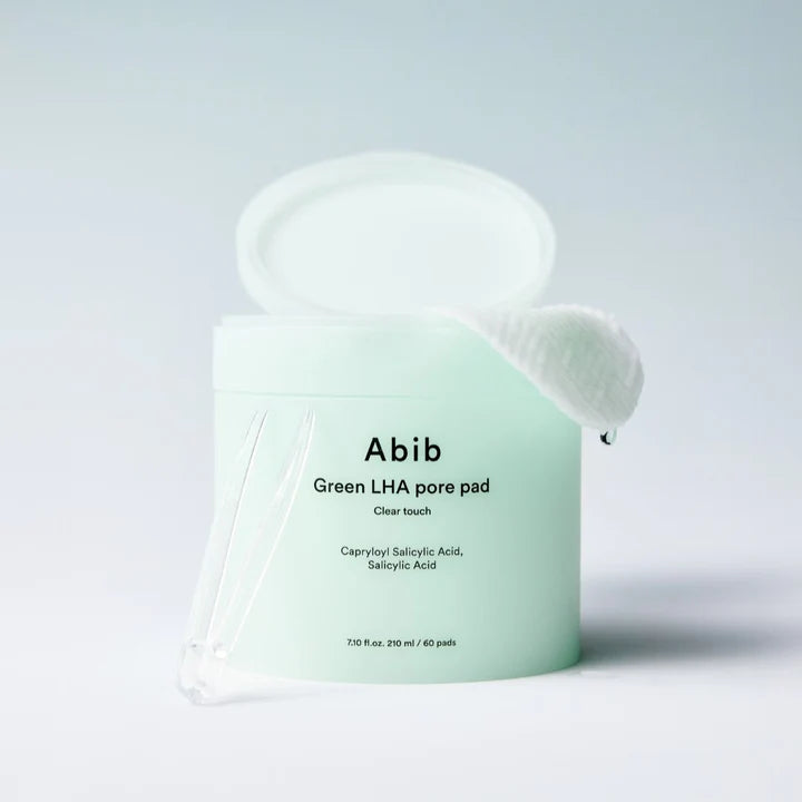 Abib Green LHA Pore Pad Clear Touch 210ml*60P - 210ml liquid solution with 60 pore pads for clear and smooth skin.