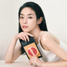 Woman promoting the Abib Gummy Sheet Mask Vita Sticker 10ea