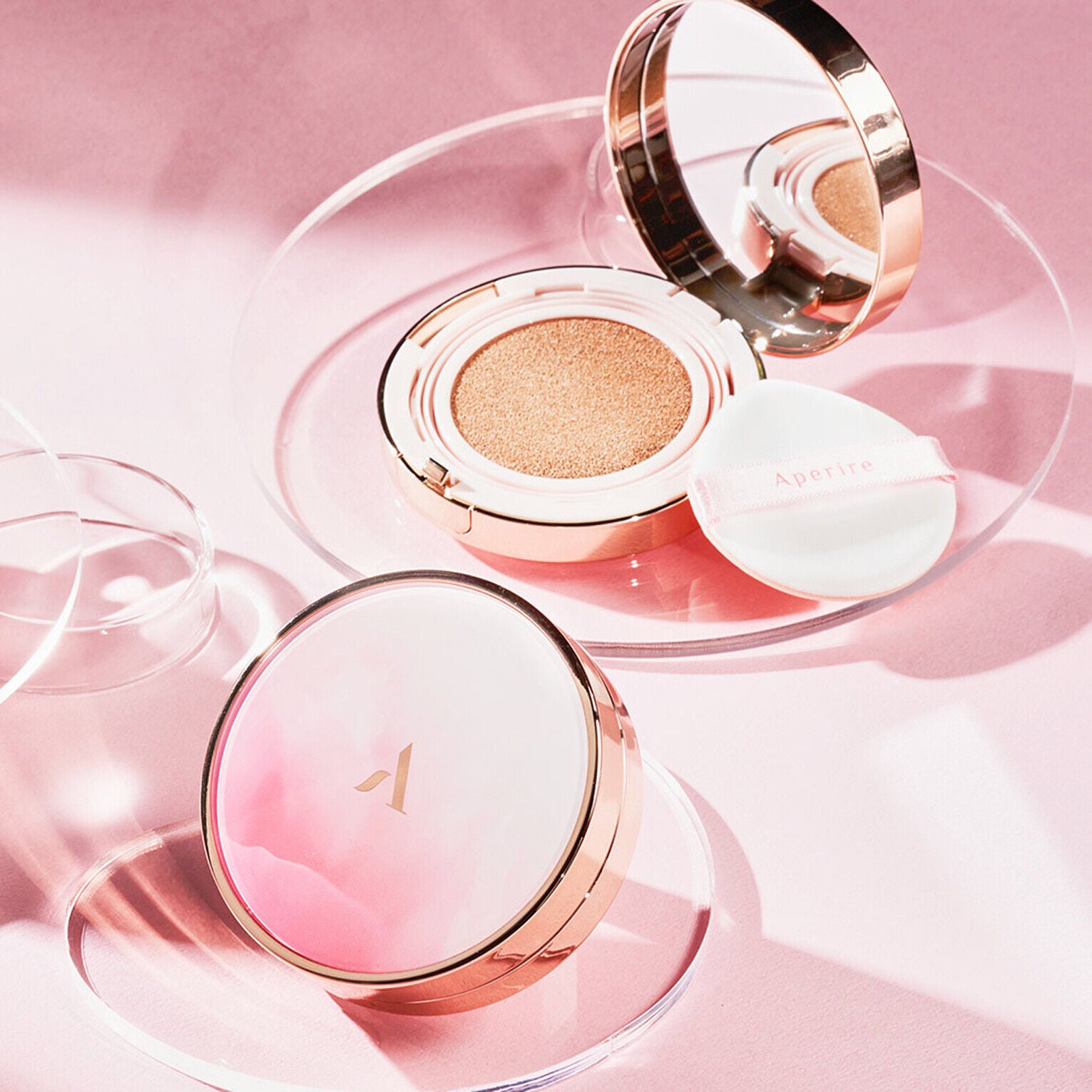 Aperire Day Dream Cover Cushion SPF50+ PA++++ 13g cushion compact showcasing multiple cushion layers.