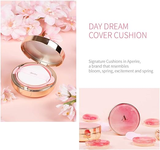 Makeup products on a pink surface: Aperire Day Dream Cover Cushion SPF50+ PA++++ 13g.