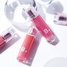 A vibrant 3.8g tube of BANILA CO Dew Glow Tint, designed to give lips a fresh, glossy finish for everyday wear.