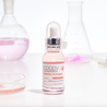 COOPY PDRN Salmon Ampoule 30ml bottle with a silver cap and pink label.