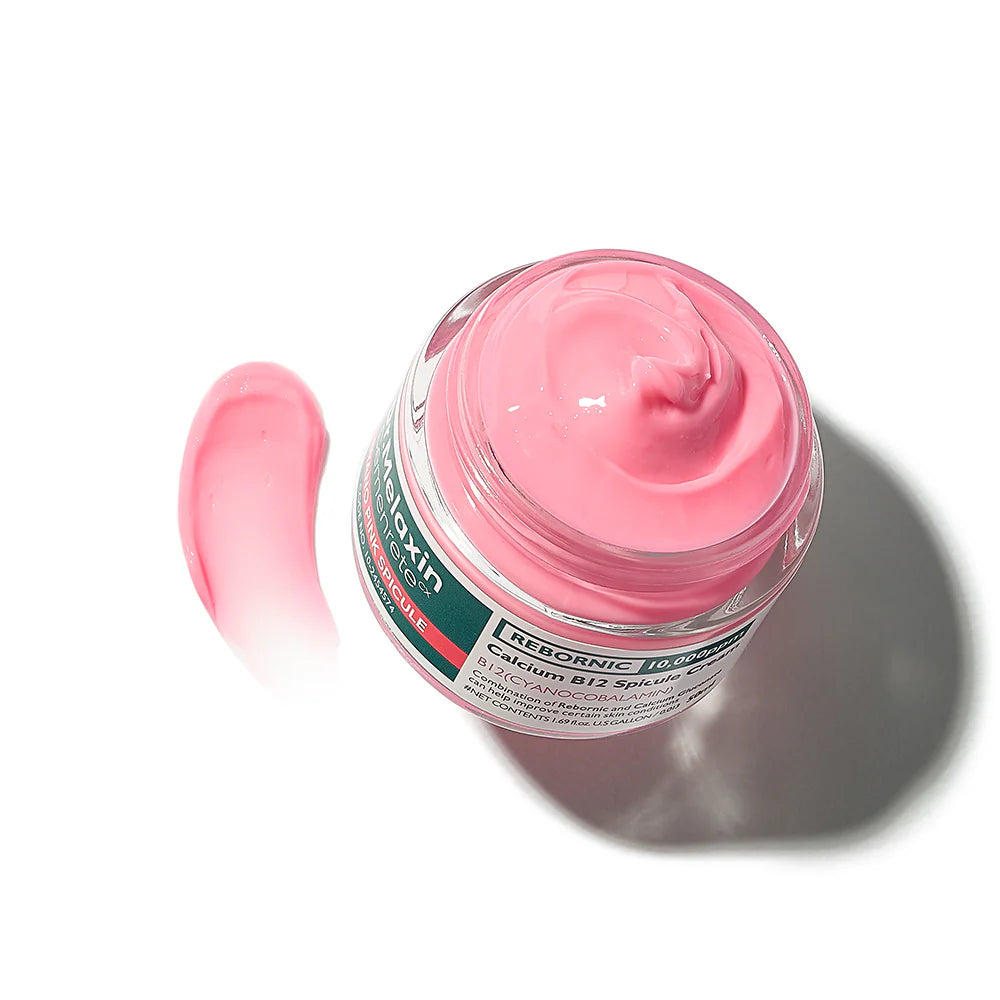 50ml tube of Dr. Melaxin Cyano Pink Spicule Cream, pink in color, for skin soothing and revitalization.