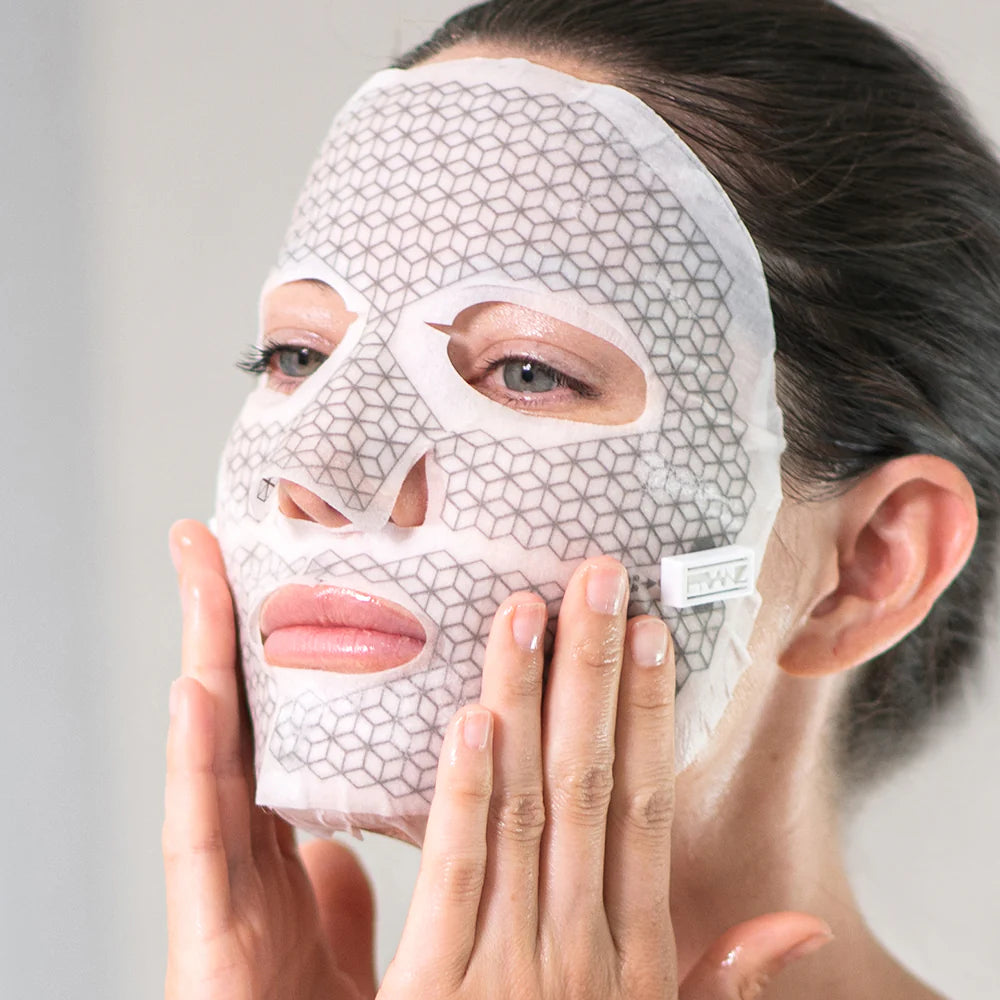 Woman applying the product of Mask Pack