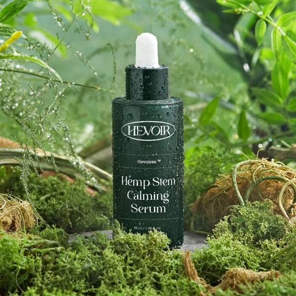 Close-up of HEVOIR Hemp Stem Calming Serum 55ml bottle, featuring natural ingredients for skin.