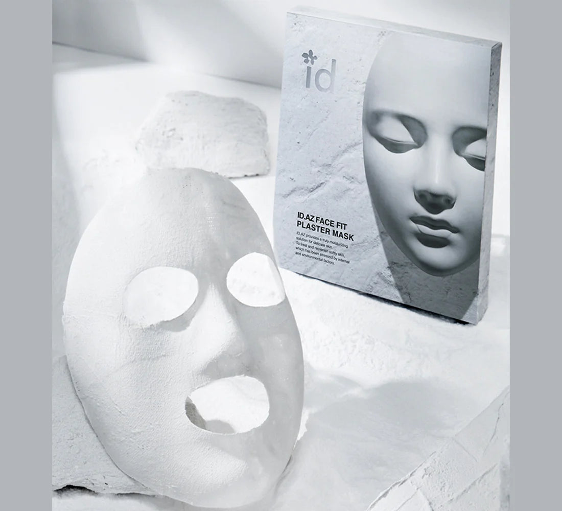 ID.AZ Face Fit Tension Plaster Mask, featuring three boxes with twelve masks each, formulated for effective facial treatment.