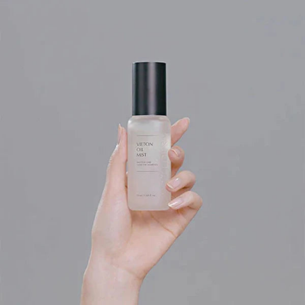 NCELLDERM Vieton Oil Mist 50ml bottle, featuring a spray nozzle and minimalist design.