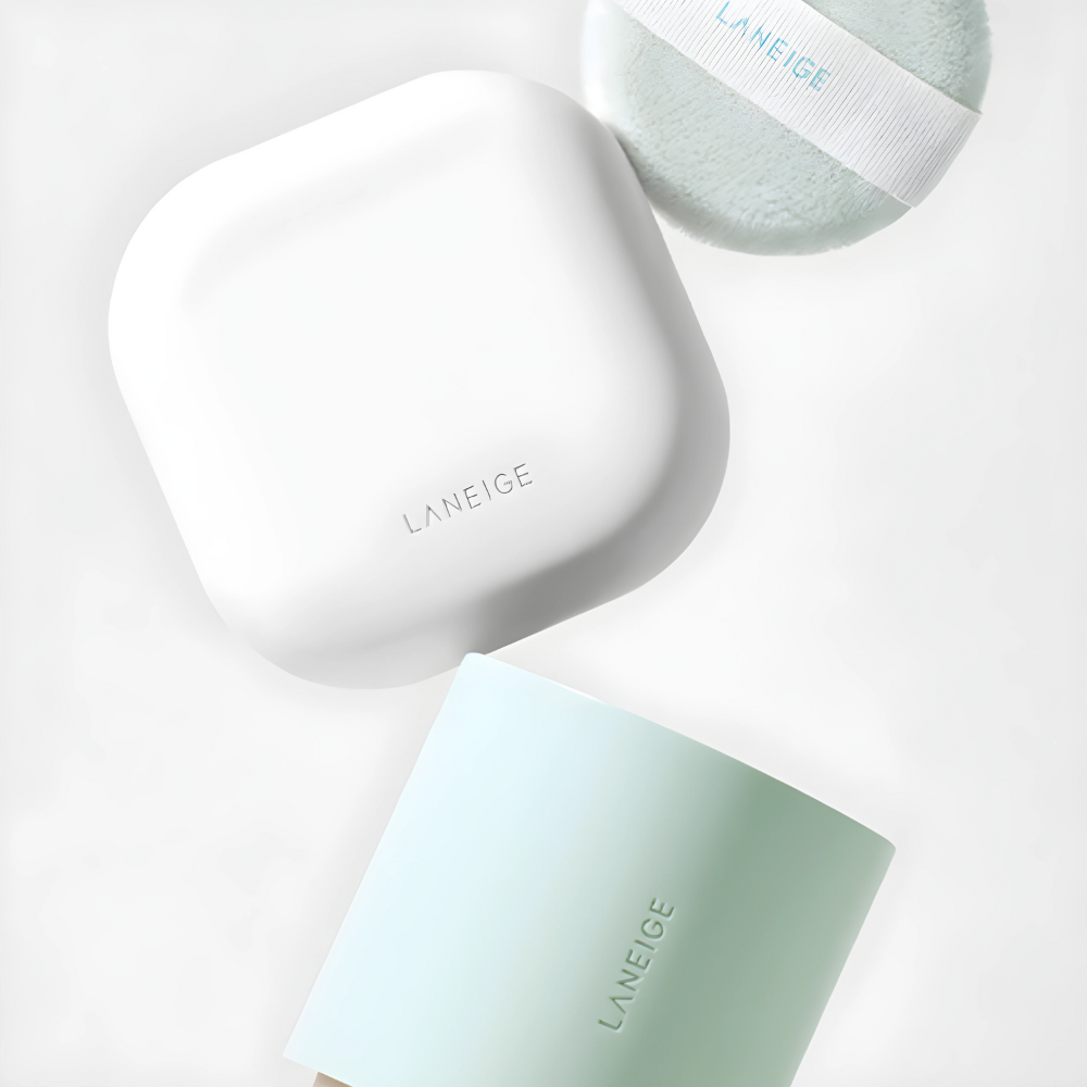 Laneige Neo Essential Blurring Finish Powder in elegant container for flawless skin.