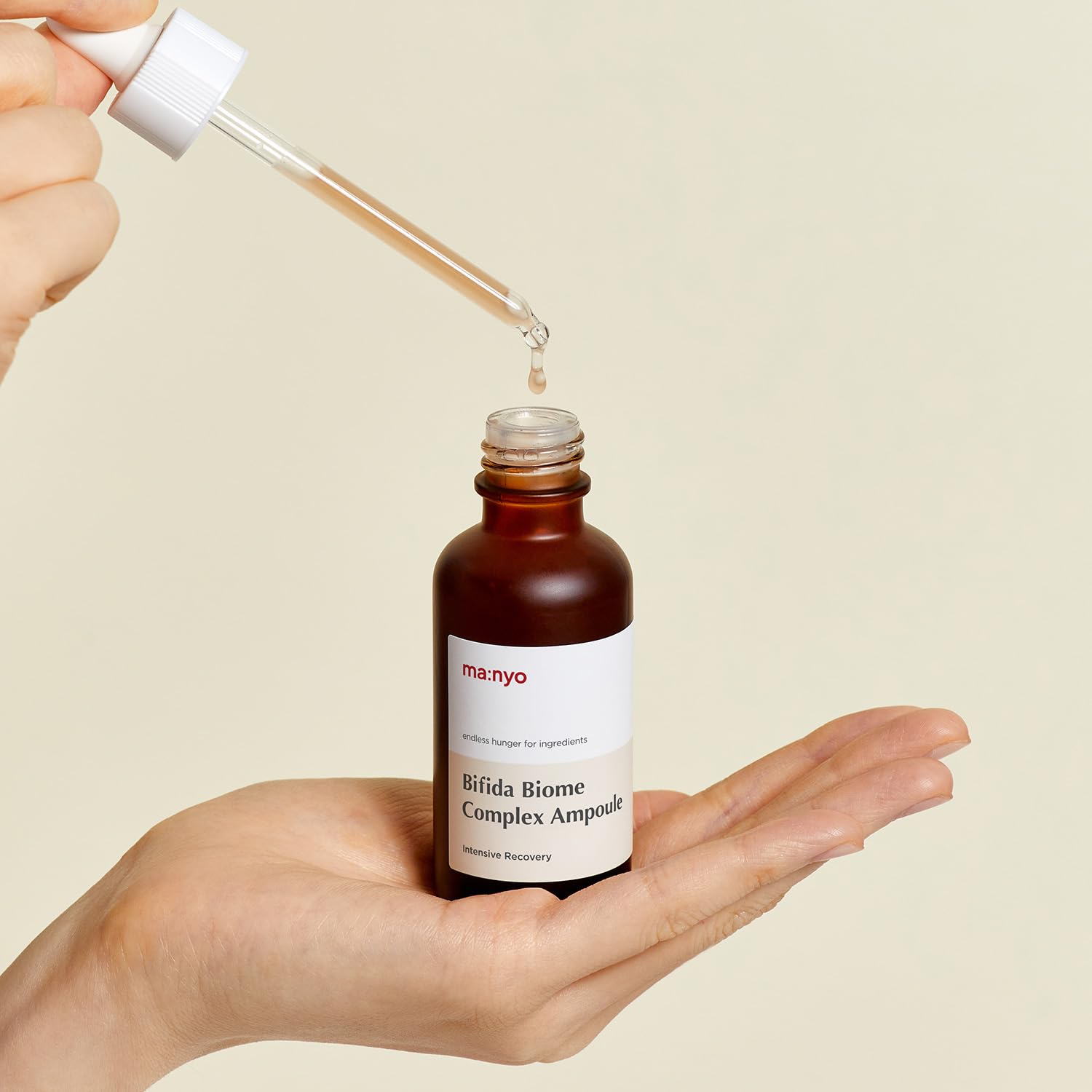 Experience the power of MANYO FACTORY's 50ml Bifida Biome Complex Ampoule, packed with probiotics for vibrant, healthy skin.