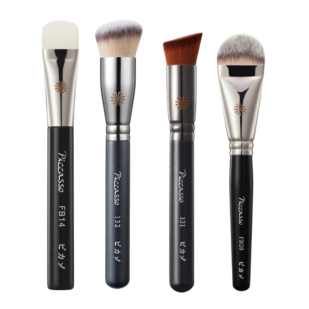 A Picasso Foundation Brush with soft bristles and a sleek handle.