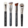 A Picasso Foundation Brush with soft bristles and a sleek handle.