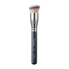 A foundation brush by Picasso featuring soft bristles and a sleek handle.