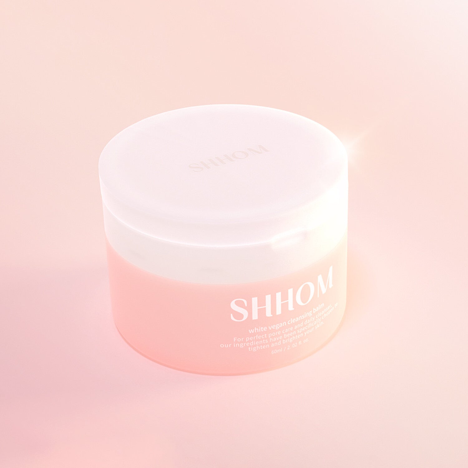 A 60ml jar of SHHOM Pore White Cleansing Balm, designed to cleanse pores and leave your skin feeling fresh and smooth.