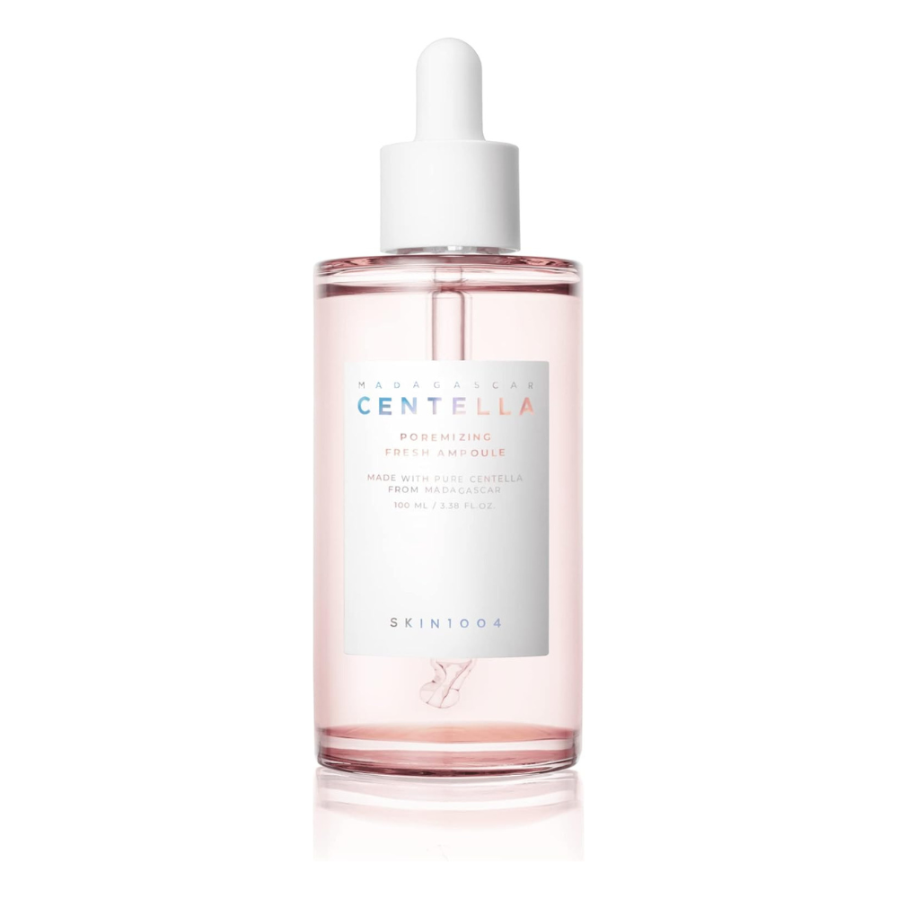 A 100ml bottle of SKIN1004 Madagascar Centella Poremizing Fresh Ampoule, designed to refresh and minimize pores.