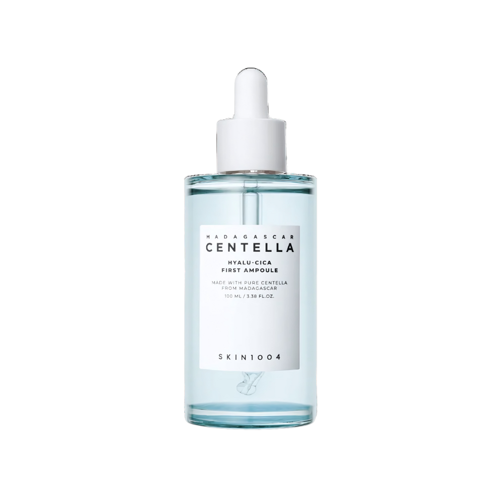 A 100ml bottle of SKIN1004 Madagascar Hyalu-Cica First Ampoule, featuring hydrating and soothing properties for the skin.
