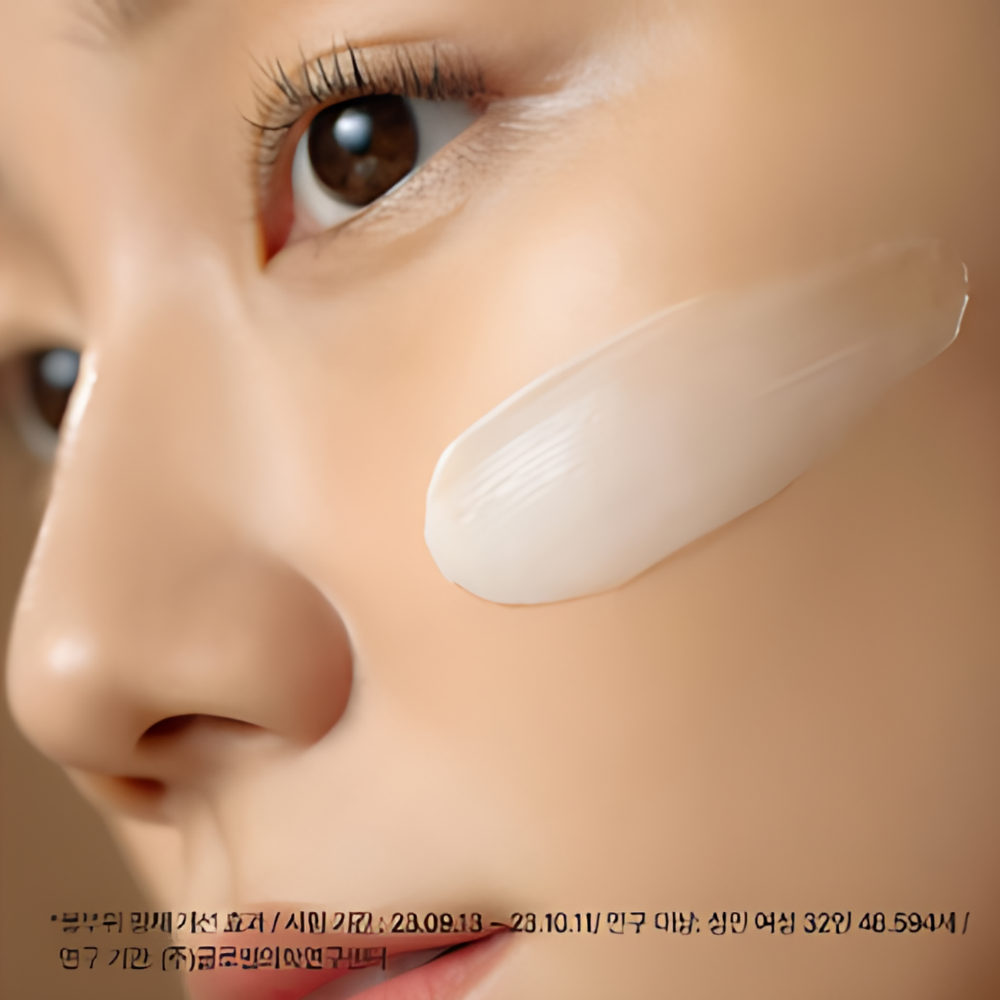 A woman's face with cream on it, using SU:M37 Fermentalift Intense Firming Cream for a rejuvenating glow.