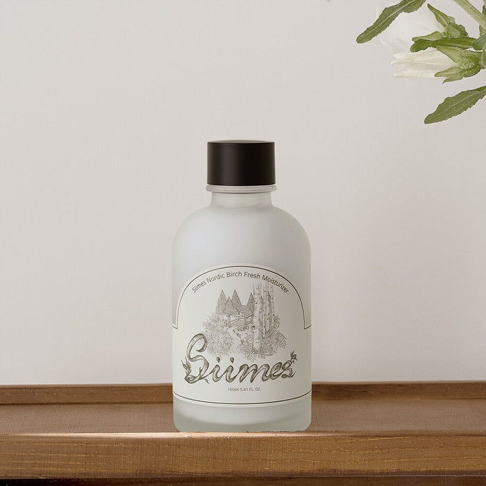 Siimes Nordic Birch Energy Essence in a 50ml bottle, featuring a minimalist design that highlights its natural ingredients.