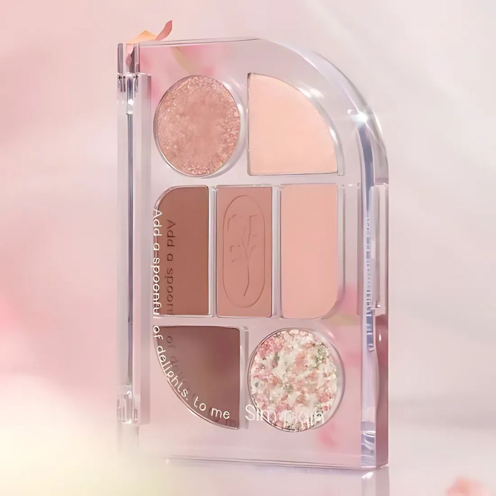 Featuring a harmonious blend of soft pastels and rich, earthy tones, this palette offers a versatile selection of 7 complementary shades, ranging from matte to shimmer finishes.