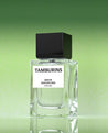 a bottle of tamburins white diamond perfume