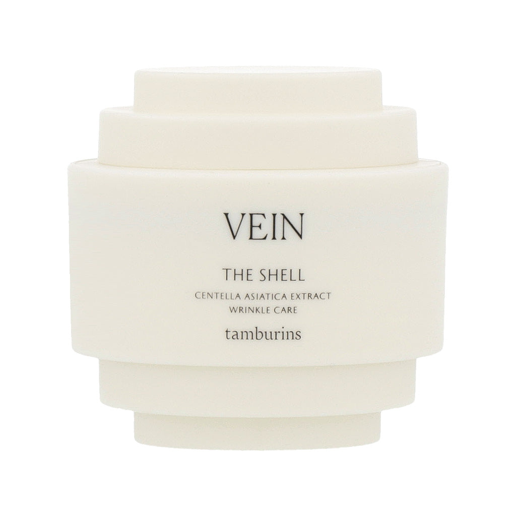 A 30ml white container with TAMBURINS THE SHELL Perfume Hand, featuring a cream-colored shell design. #VEIN