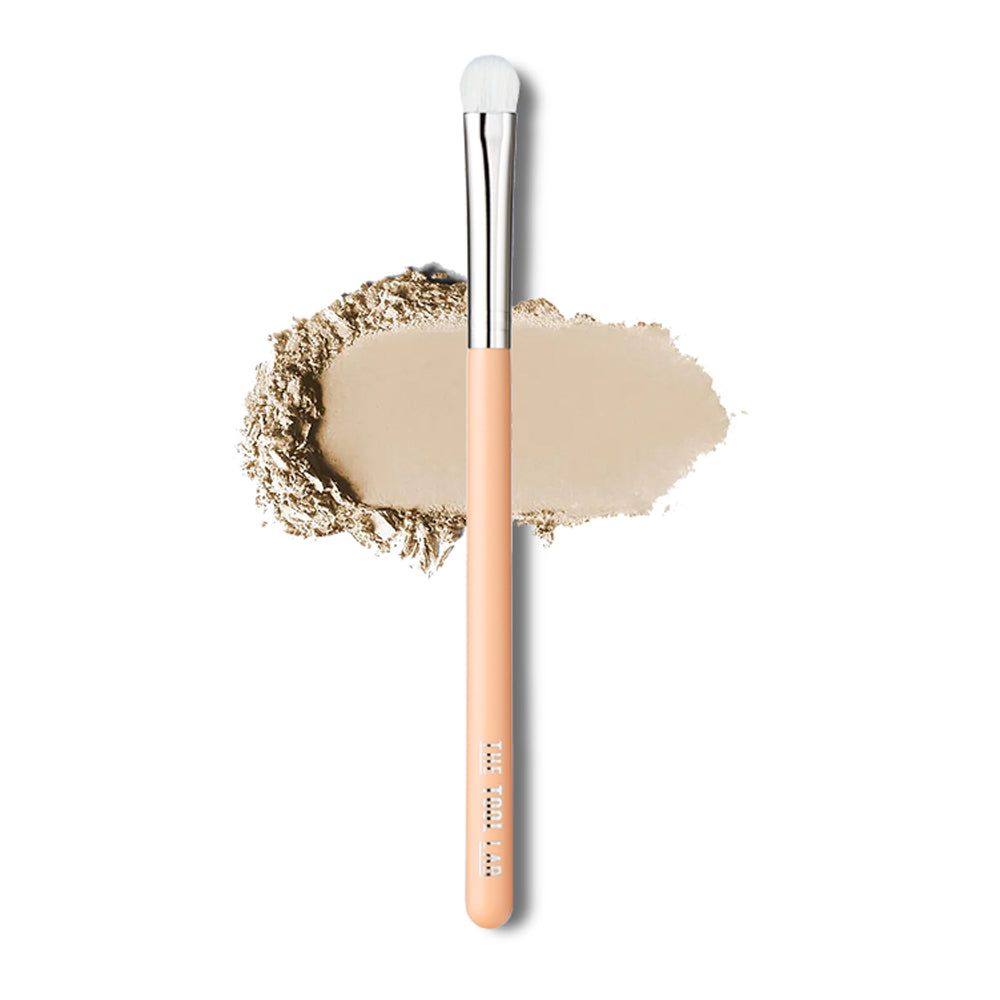 The TOOL LAB 203 Point Eye Shadow Brush is a precise tool designed for detailed eyeshadow application