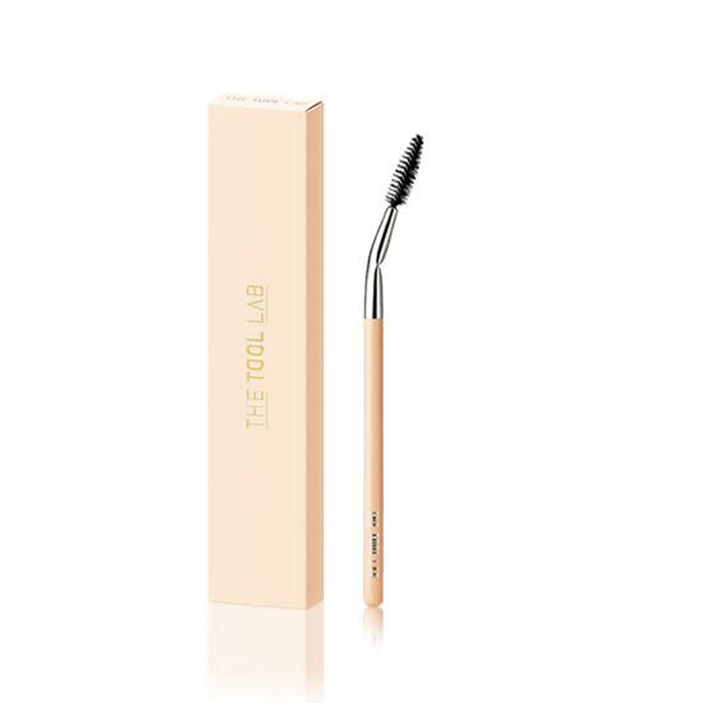  One end features a spoolie brush, which is used to groom, shape, and separate eyelashes and eyebrows.