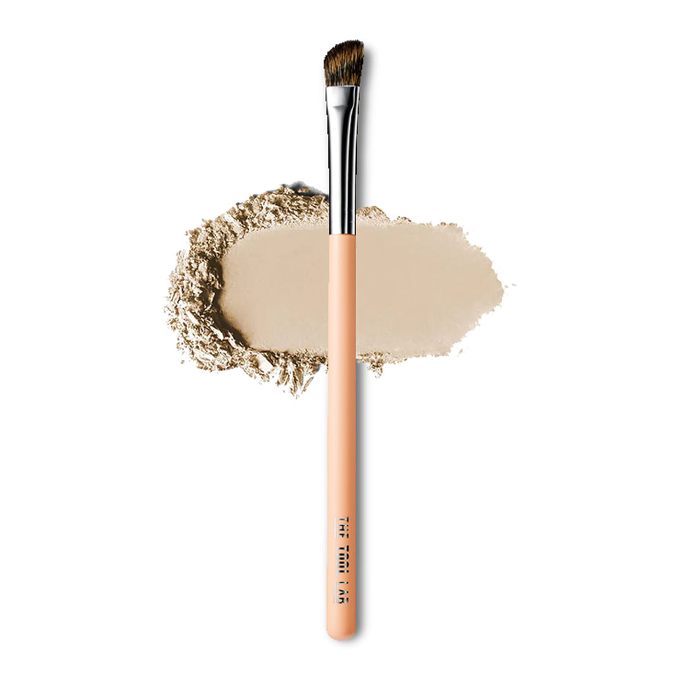 THE TOOL LAB 223 Eye Contour Brush is designed for precise contouring and blending of eyeshadow along the crease and outer corners of the eyes.