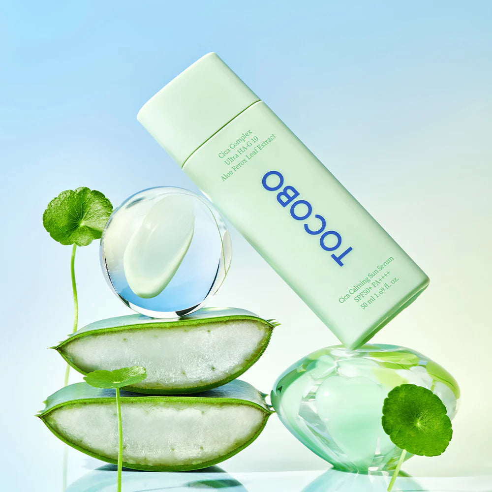 Green and white 50ml TOCOBO Cica Calming Sun Serum SPF50+ PA++++ bottle for sun protection.