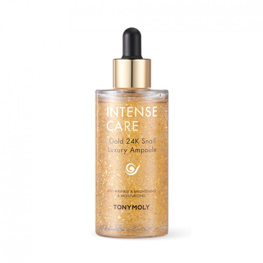  A 100ml bottle of TONYMOLY INTENSE CARE 24K GOLD Snail Luxury Ampoule, designed for intense skin care with luxurious ingredients.