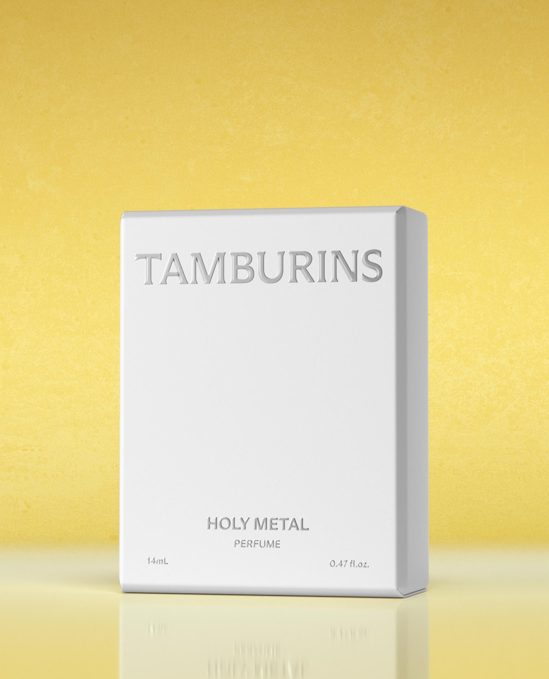 a box of TAMBURINS THE EGG PERFUME PUMKTAMBURINS on a yellow background
