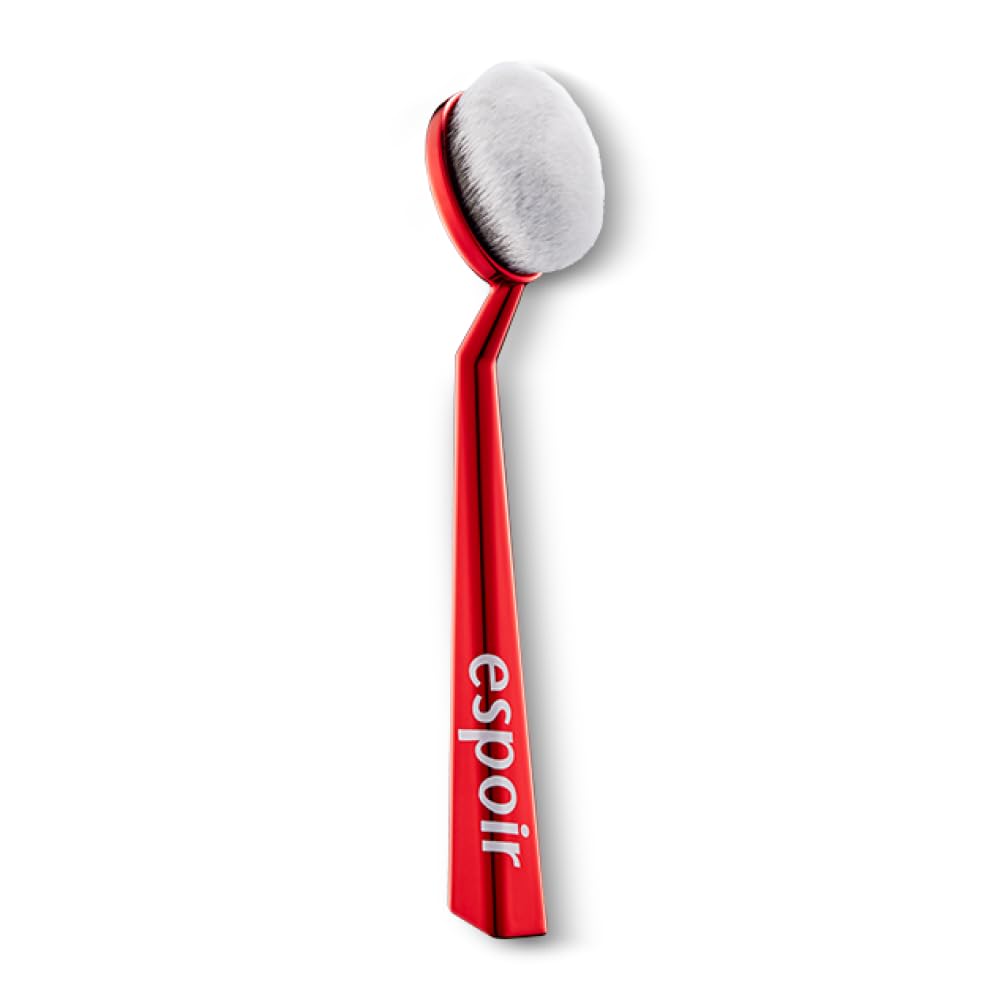 Soft face brush with espoir branding, ideal for gentle cleansing and exfoliation.
