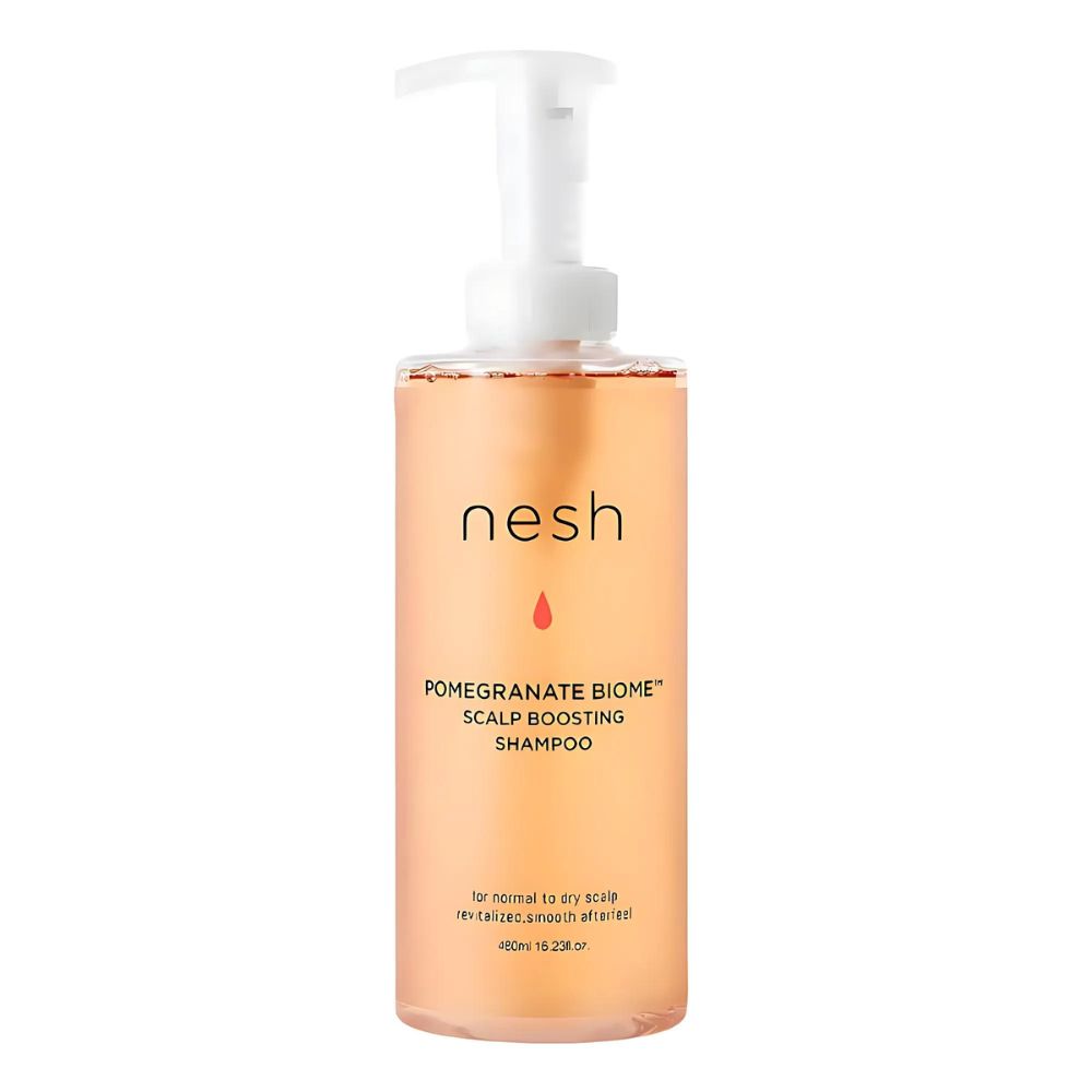 Revitalize your scalp and hair with nesh Pomegranate Biome Scalp Boosting Shampoo, a 480ml powerhouse formulated to nourish and strengthen. 