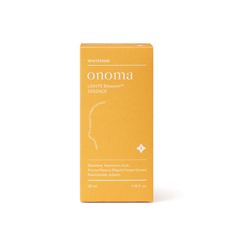 Elegant 35ml onoma LIGHTS Blossom™ Essence bottle, adorned with a floral pattern.