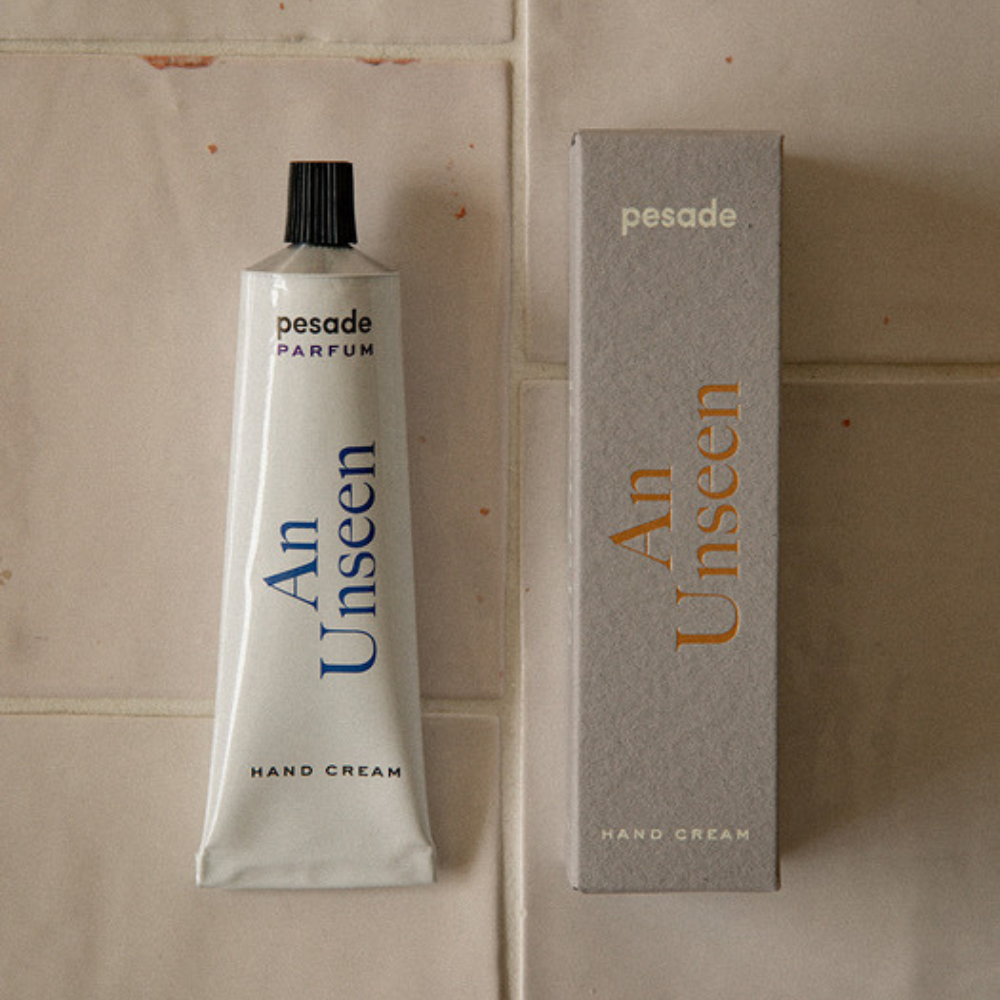 Pesade An Unseen Hand Cream in a 50ml tube, ideal for providing hydration and softness to dry, rough hands.