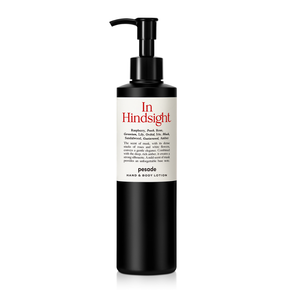 Hand and body lotion in a 250ml bottle, labeled "In Hindsight" by Pesade, designed for moisturizing and nourishing skin.