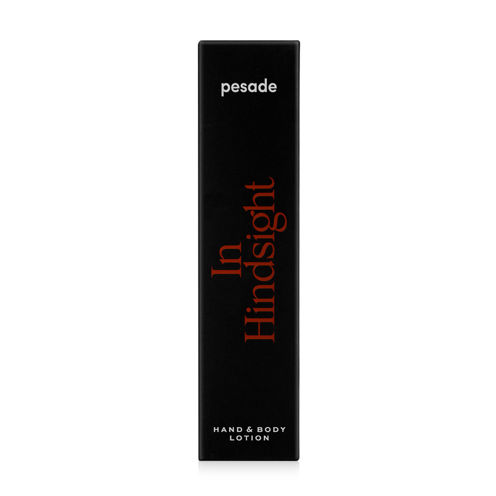 Pesade's "In Hindsight" hand and body lotion, 250ml, offers hydration and care for skin, presented in an elegant bottle.