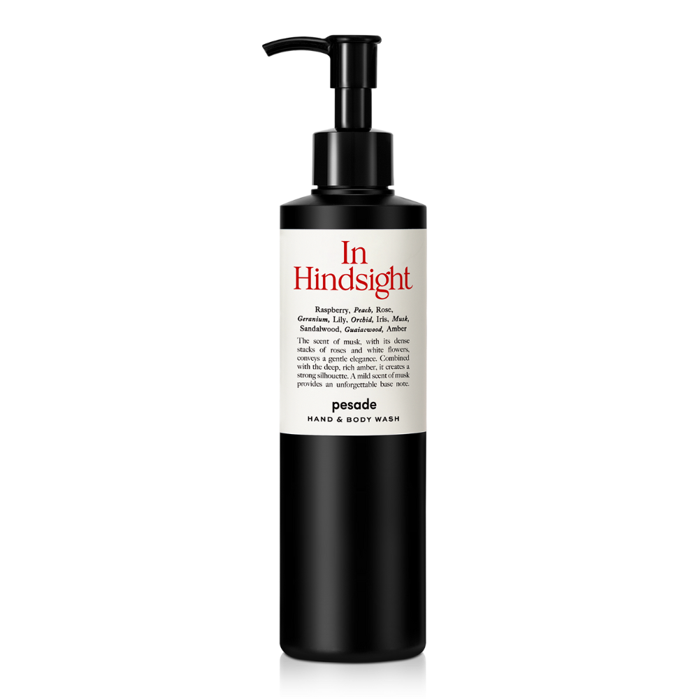 Hand and body wash bottle, 250ml, featuring a sleek design and the label "In Hindsight" by Pesade.
