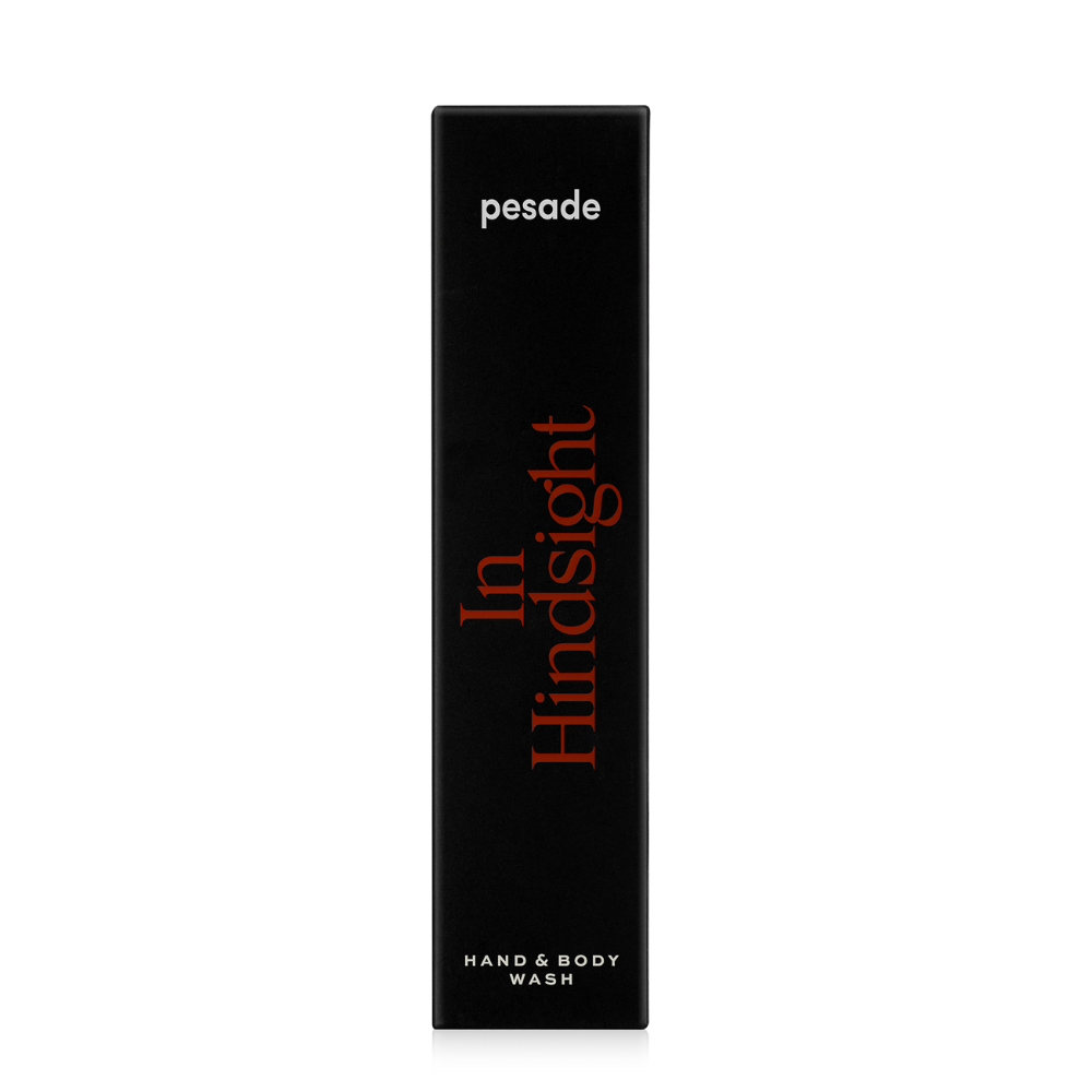 250ml bottle of Pesade's In Hindsight hand and body wash, showcasing an elegant design and soothing color palette.